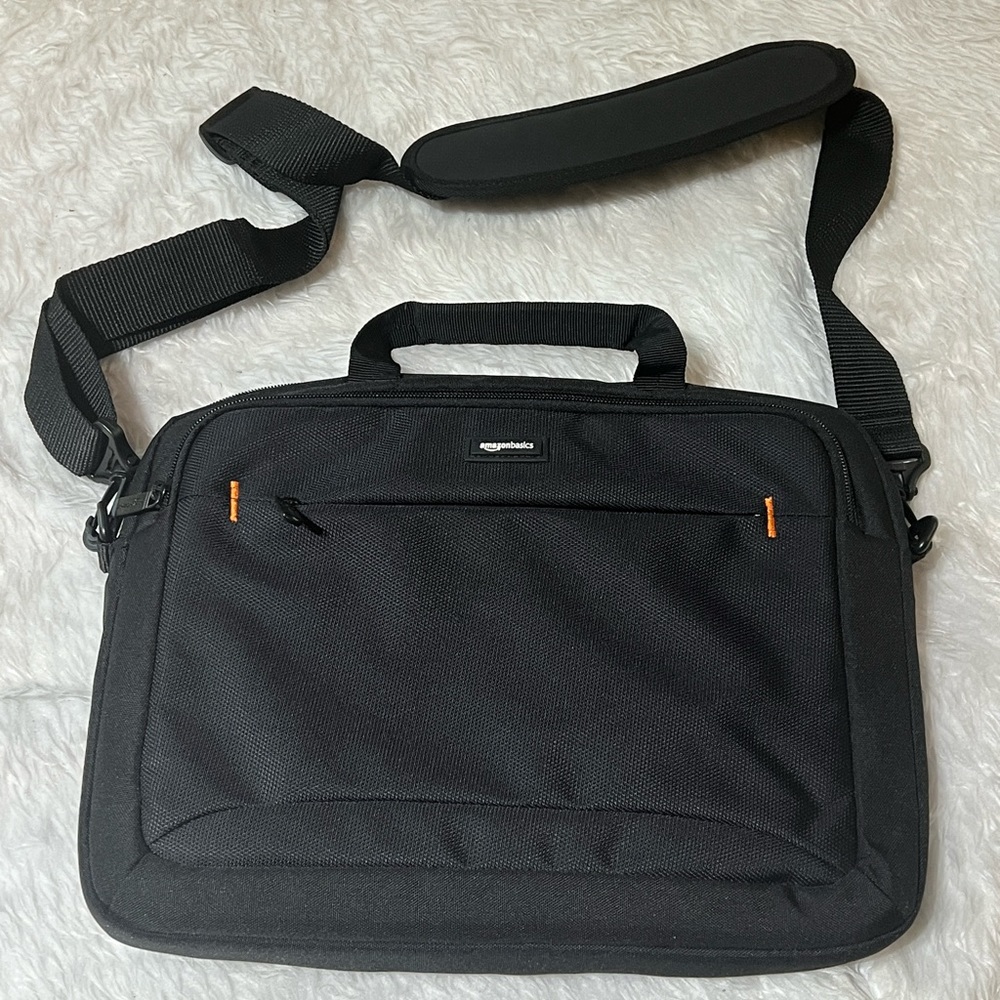 Amazon Basics 14” Tablet Bag. Black. New condition/never used.  Front pocket.